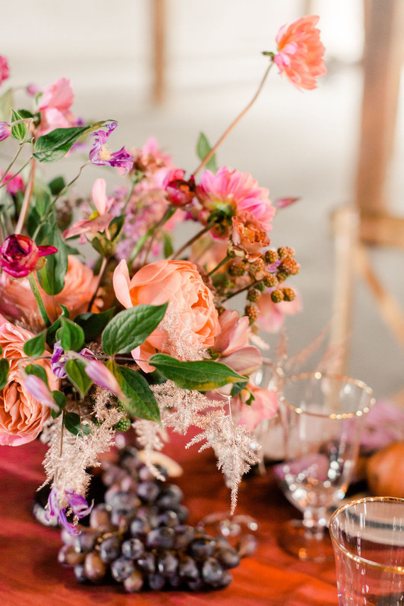 Bright moody spring wedding inspo with a dramatic floral curtain
