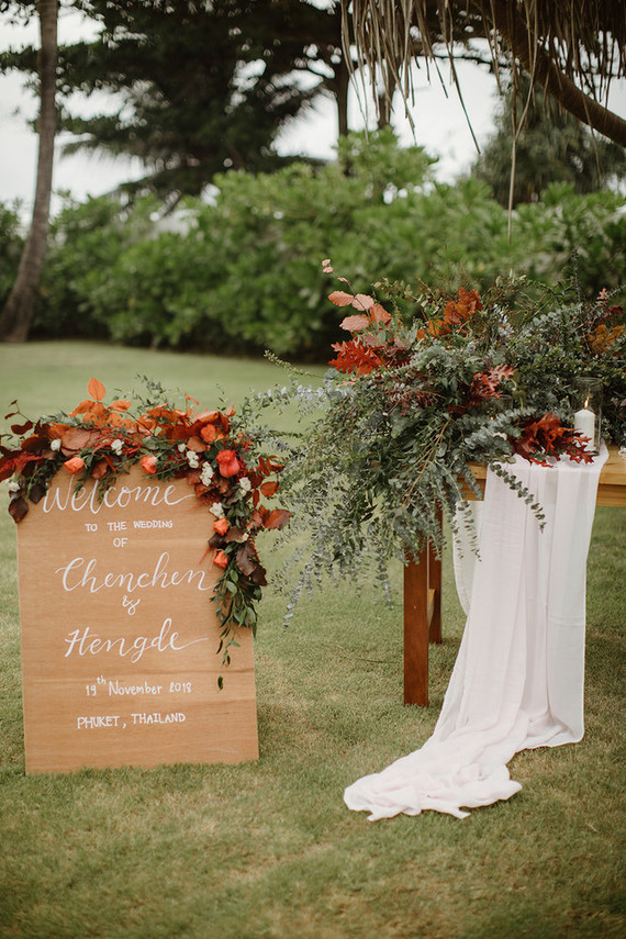 Tropical fall wedding in Thailand with rust and peachy accents