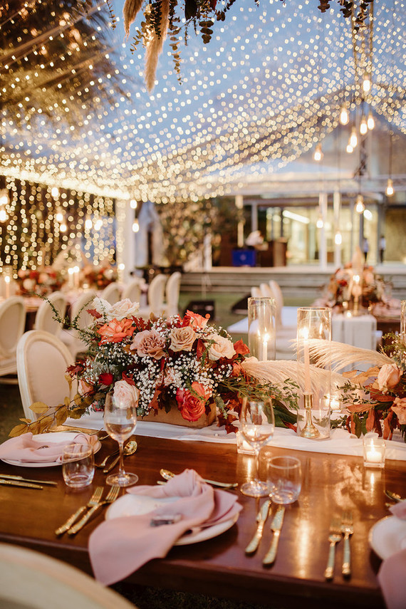 Tropical fall wedding in Thailand with rust and peachy accents