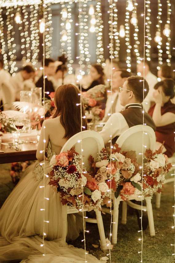 Tropical fall wedding in Thailand with rust and peachy accents