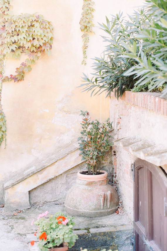Romantic destination wedding at a pink Tuscan villa