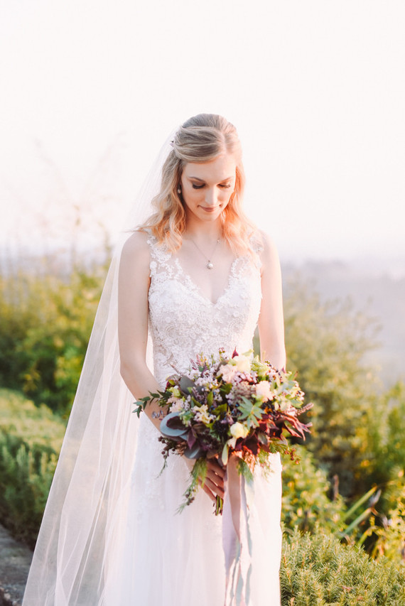 Romantic destination wedding at a pink Tuscan villa