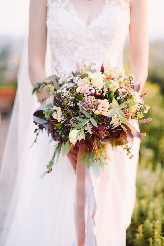 Romantic destination wedding at a pink Tuscan villa