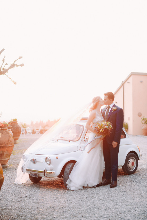 Romantic destination wedding at a pink Tuscan villa