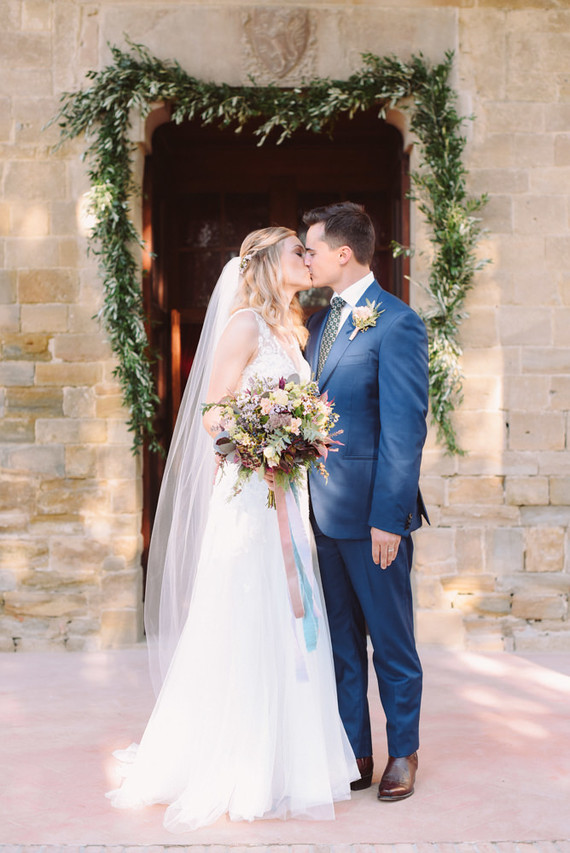 Romantic destination wedding at a pink Tuscan villa