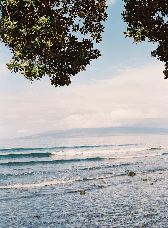 Romantic Hawaii wedding with an insanely cool dress, inspired by a Maui sunset