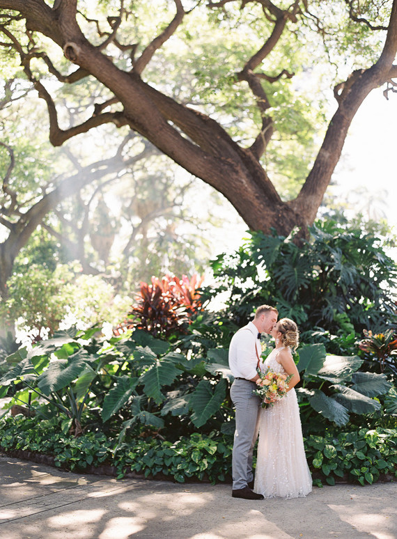 Romantic Hawaii wedding with an insanely cool dress, inspired by a Maui sunset