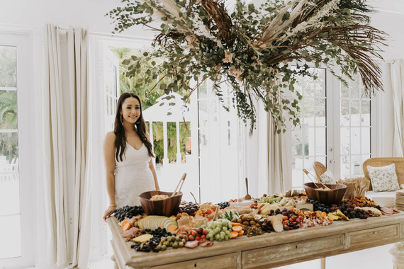 amazing grazing table for an all white bridal shower