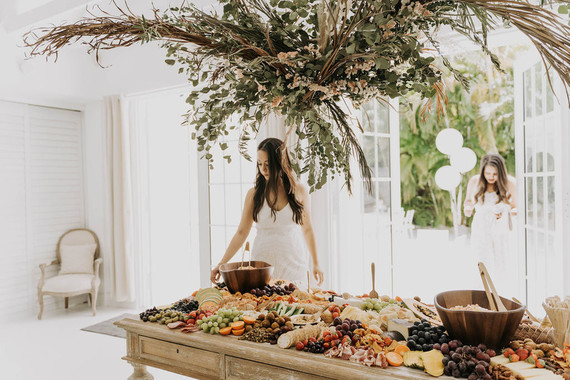 amazing grazing table for an all white bridal shower