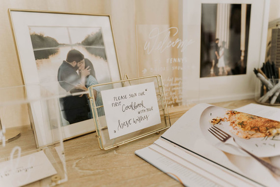 All white olive branch bridal shower with an epic grazing table