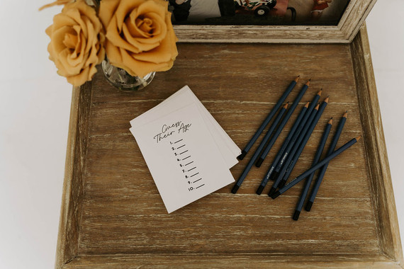 All white olive branch bridal shower with an epic grazing table