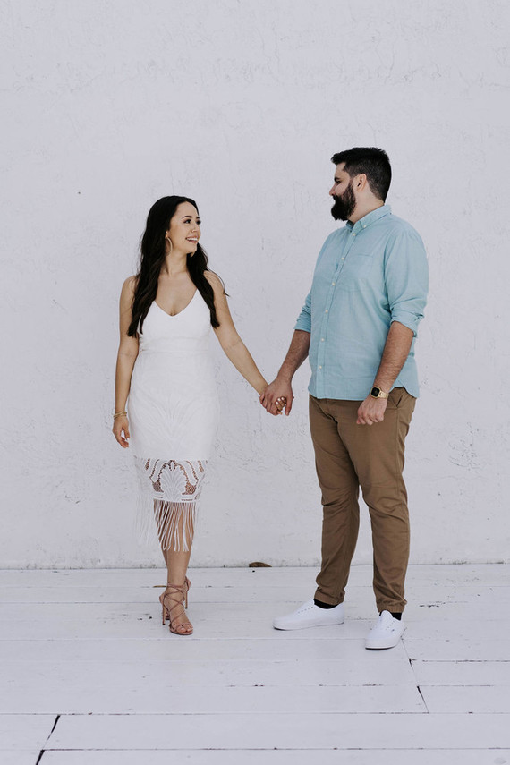 All white olive branch bridal shower with an epic grazing table