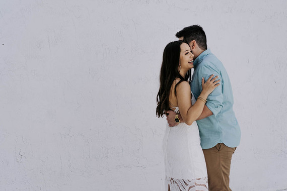 All white olive branch bridal shower with an epic grazing table