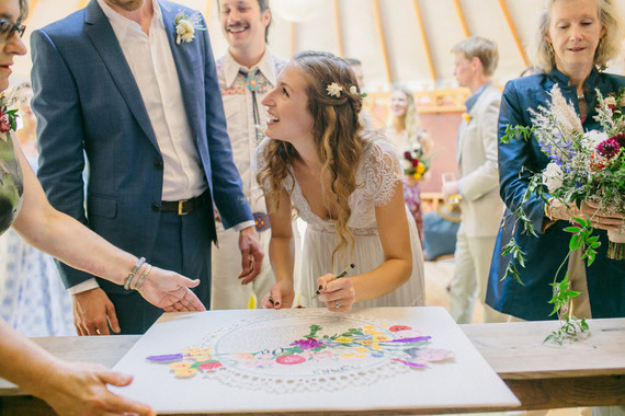 beautifully rustic Anderson Valley wedding with a hippie bus and floral mandala