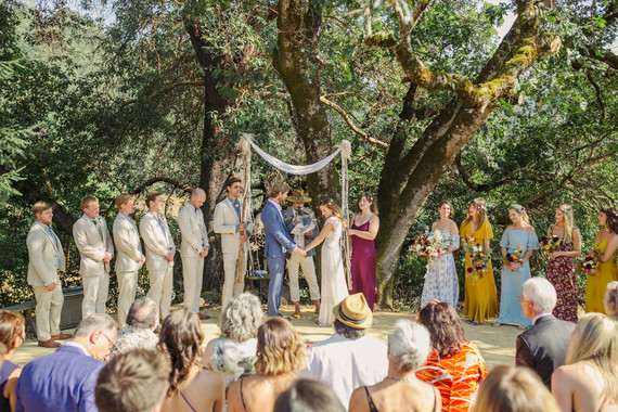 Ceremony with handmade chuppah and floral mandala Inspiration