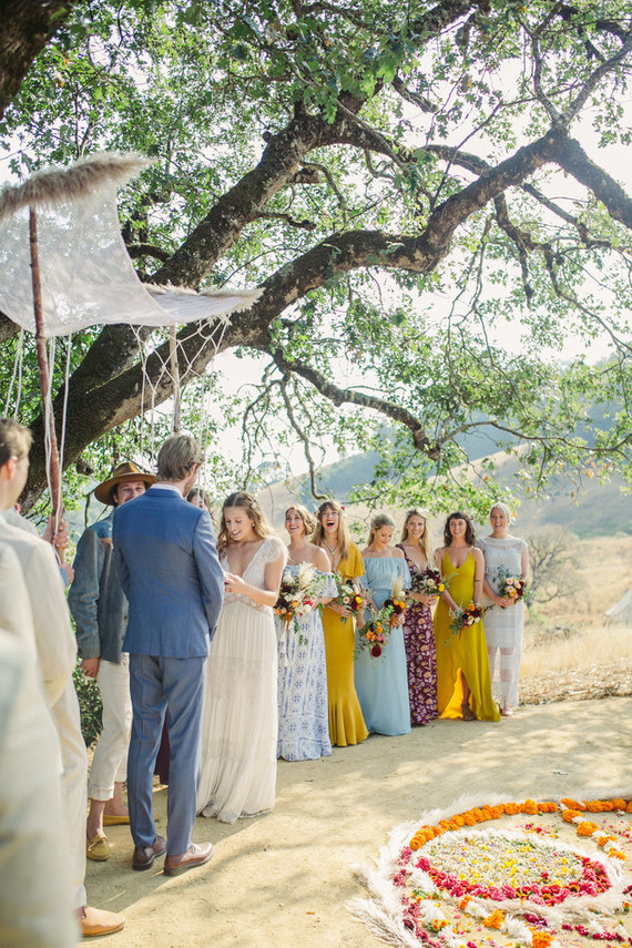 Ceremony with handmade chuppah and floral mandala