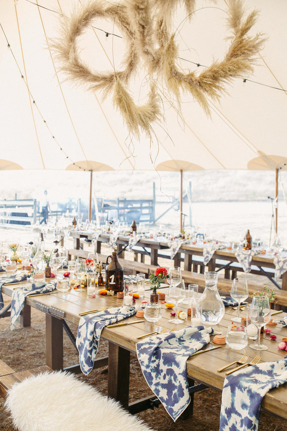 wedding tent with pampas grass wreaths