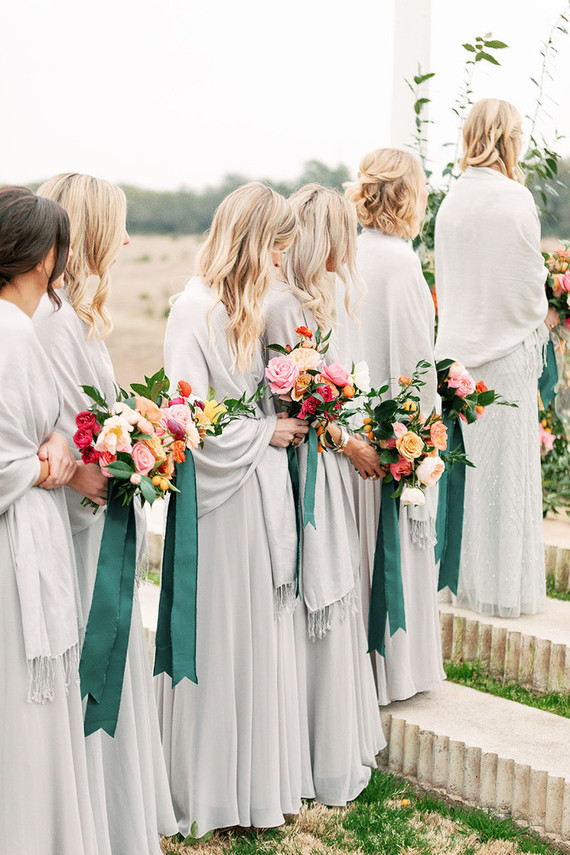 grey bridesmaids dresses with shawls and jewel tone bouquets