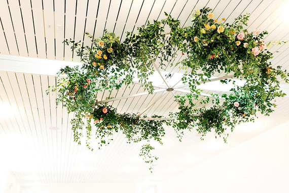 floral ceiling wreath installation