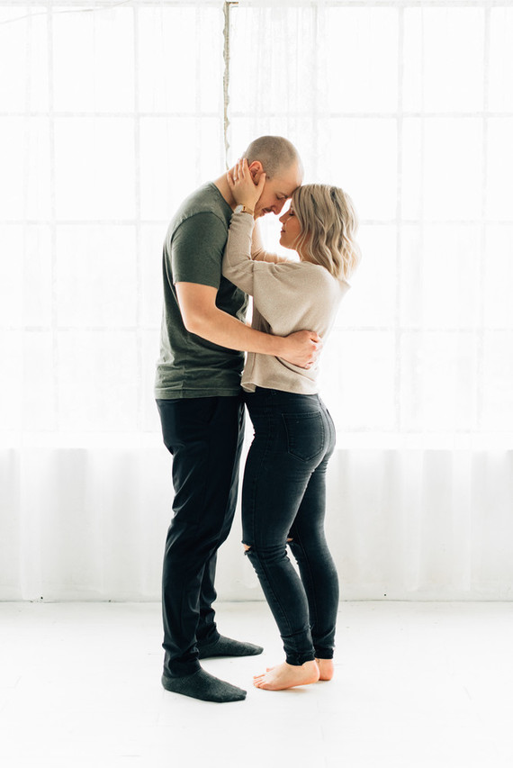 Cozy rainy day engagement photos styled at home