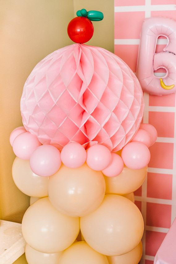 Pink and yellow Museum of Ice Cream themed first birthday party