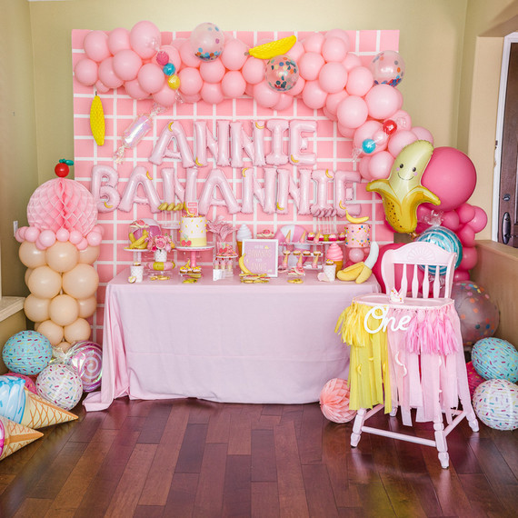 Pink and yellow Museum of Ice Cream themed first birthday party