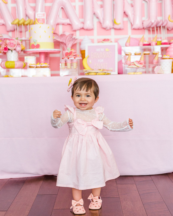 Pink and yellow Museum of Ice Cream themed first birthday party