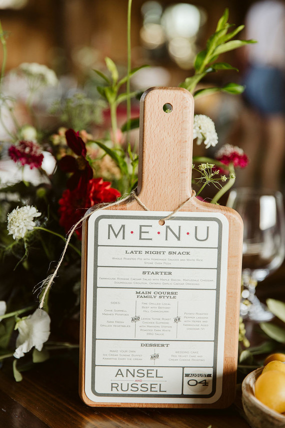 Cutting board wedding details for barn wedding