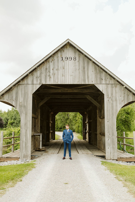 Farm to table summer wedding with pops of red and a PARADE