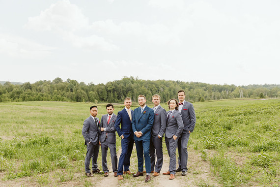 Farm to table summer wedding with pops of red and a PARADE