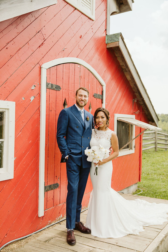 Farm to table summer wedding with pops of red and a PARADE