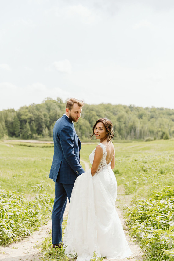 Farm to table summer wedding with pops of red and a PARADE