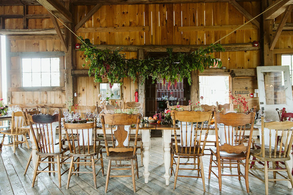 Farm to table summer barn wedding with pops of red and a PARADE
