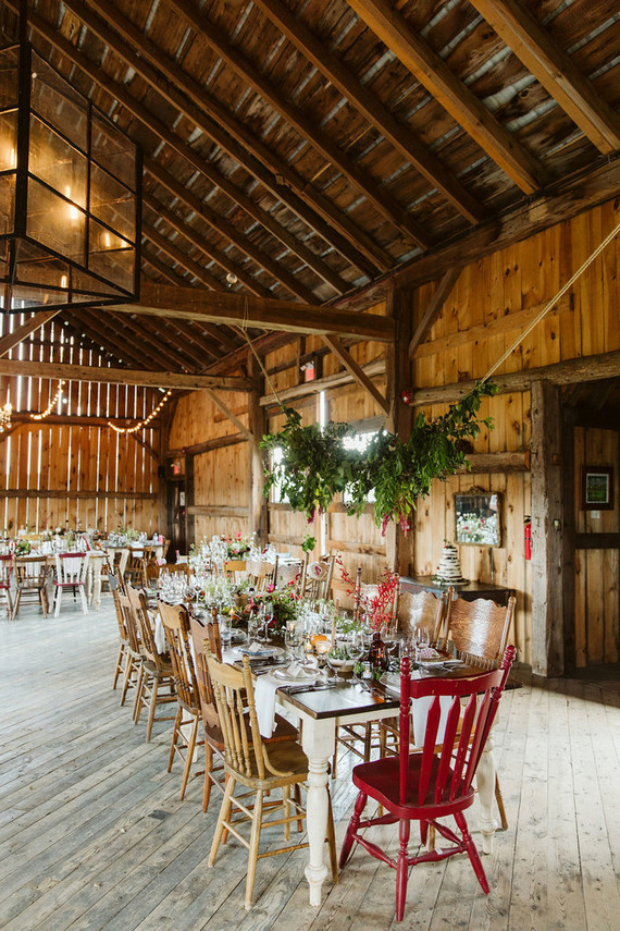Farm to table summer barn wedding with pops of red and a PARADE
