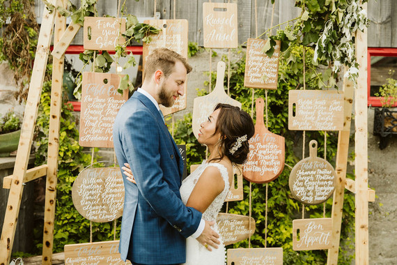 Farm to table summer barn wedding with pops of red and a PARADE