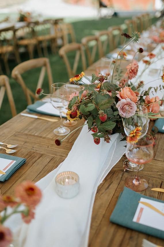 A rustic barn wedding at Red Barn Ranch inspired by berries and summer flowers