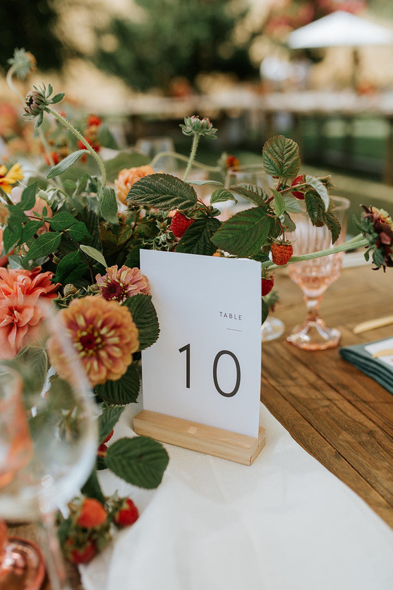 A rustic barn wedding at Red Barn Ranch inspired by berries and summer flowers