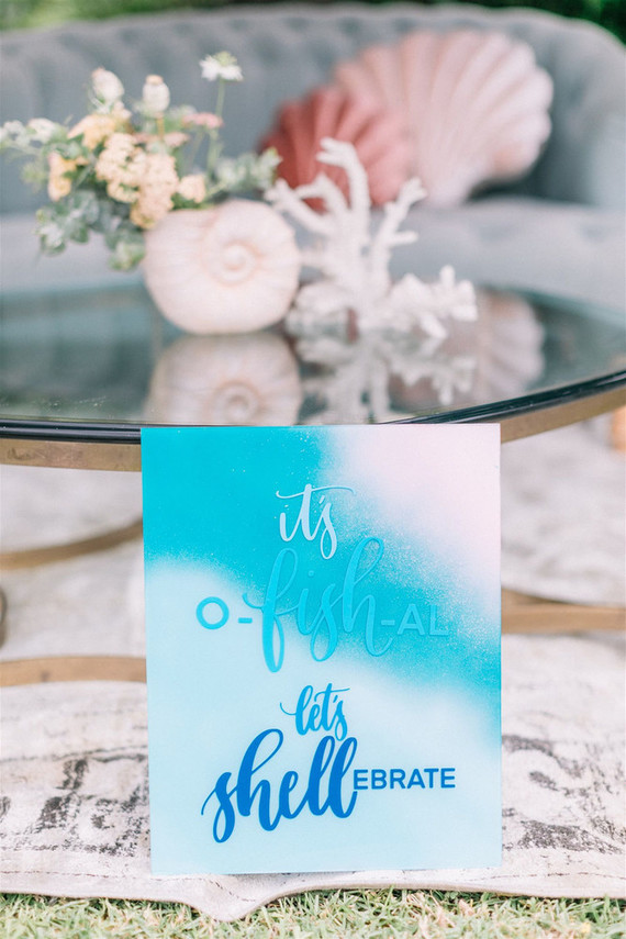 Sharks and mermaids joint birthday pool party