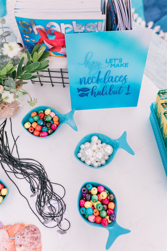 Sharks and mermaids joint birthday pool party