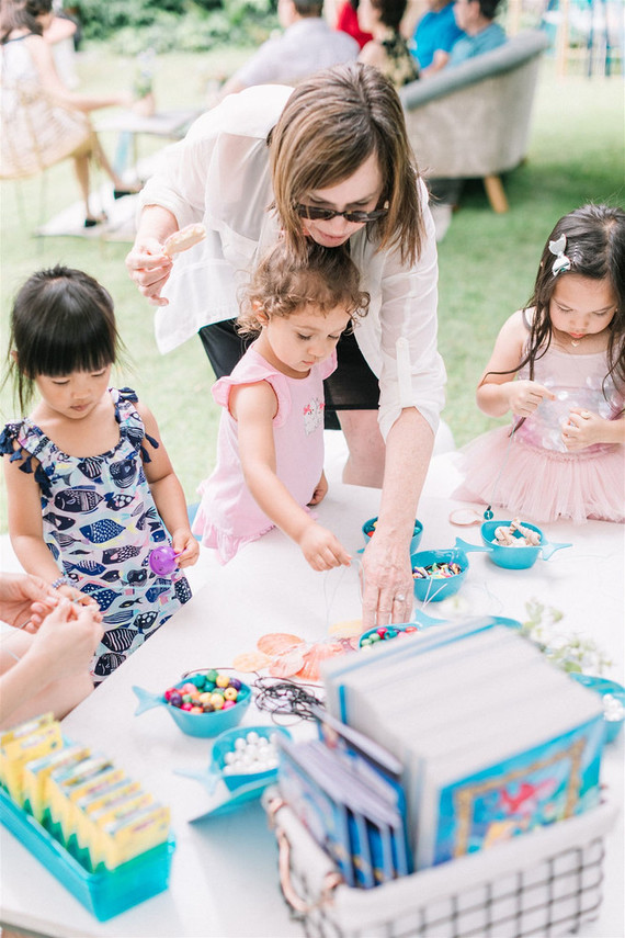 Sharks and mermaids joint birthday pool party