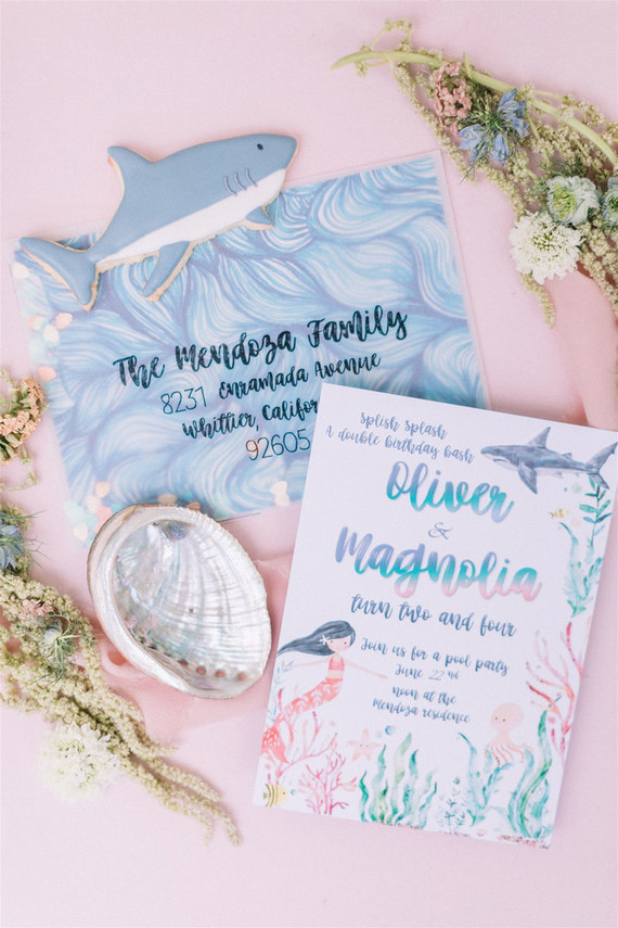 Sharks and mermaids joint birthday pool party