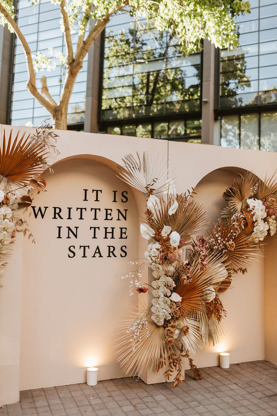 Palm leaf wedding backdrop Inspiration