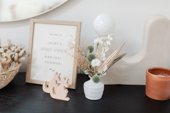 warm baby shower with dried florals Inspiration