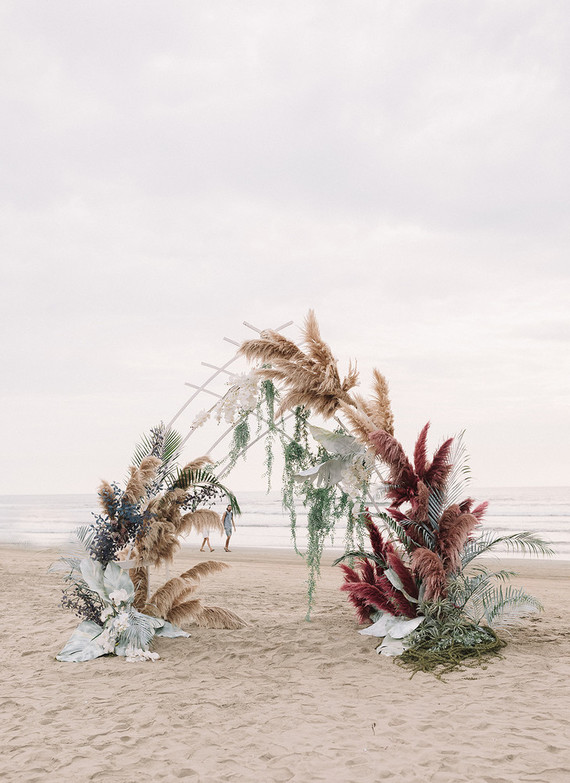 Dyed floral ceremony arch
