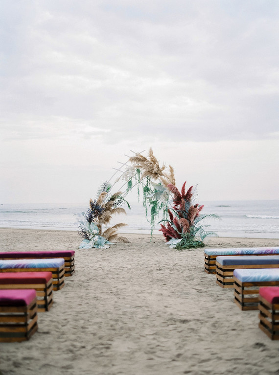 Dyed floral ceremony arch