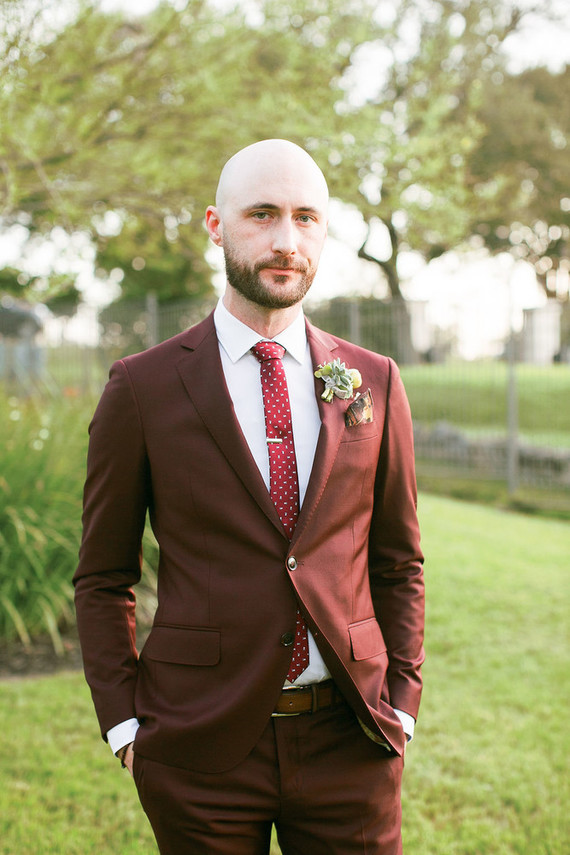Burgundy groom's suit