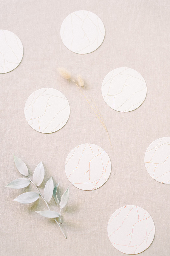 Gold and white coasters