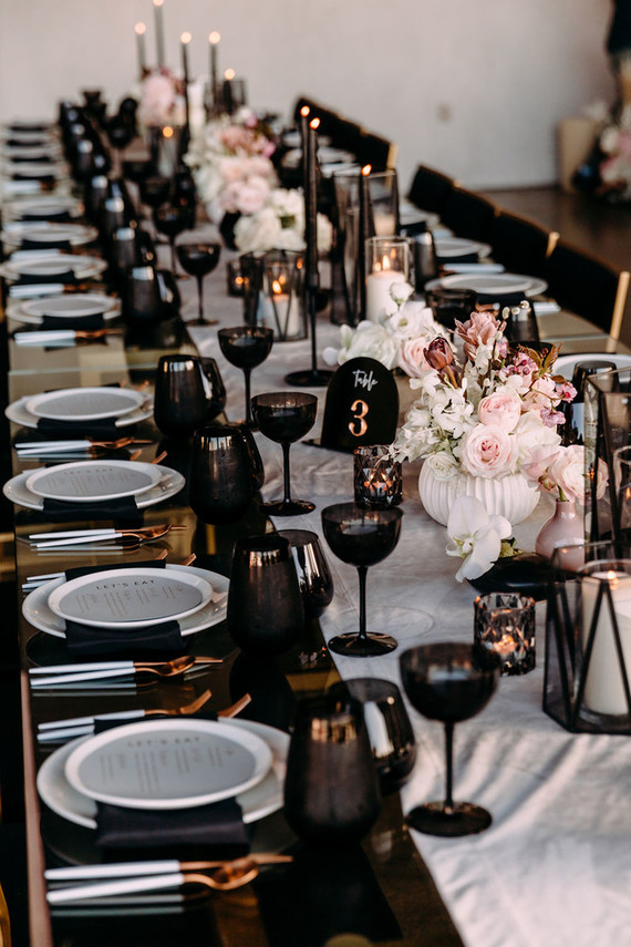 Black, gold, and pink tables cape