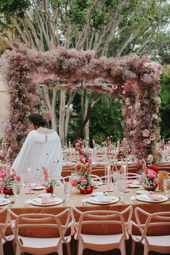 Pink babies breath wedding arch