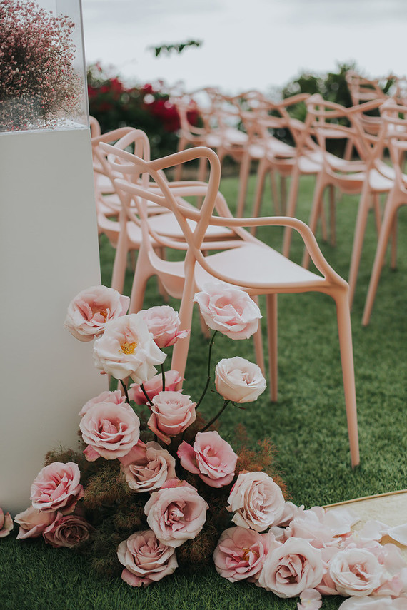 Gorgeous pink roses for wedding aisle
